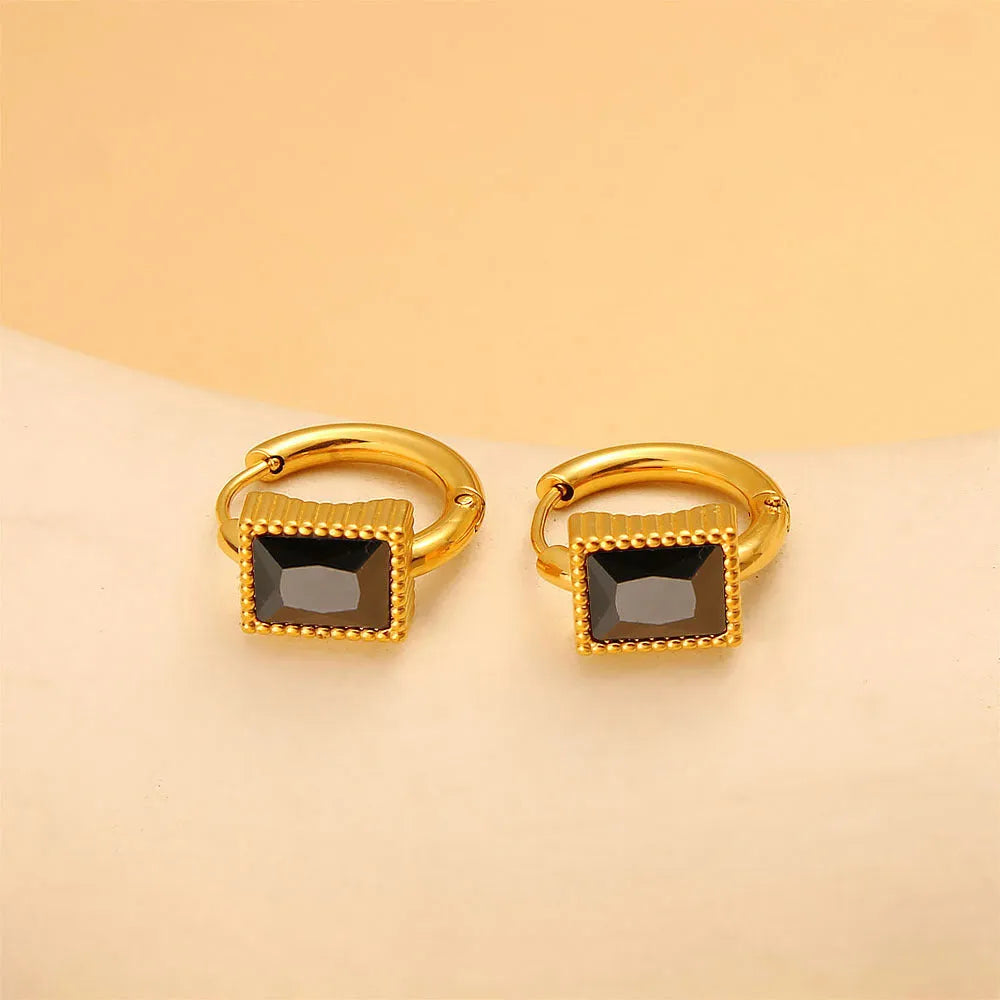 A pair of square stainless steel earrings with round zircon details, shown in a choice of black, green, or white colour.