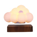 Magnetic levitation cloud lamp floating above base with warm white light, ABS flower-shaped lampshade