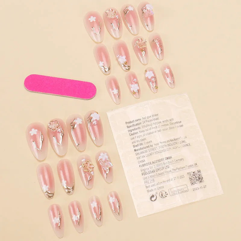 Gold silk butterfly nail tips with flower patterns and gradient gilding in medium drop shape