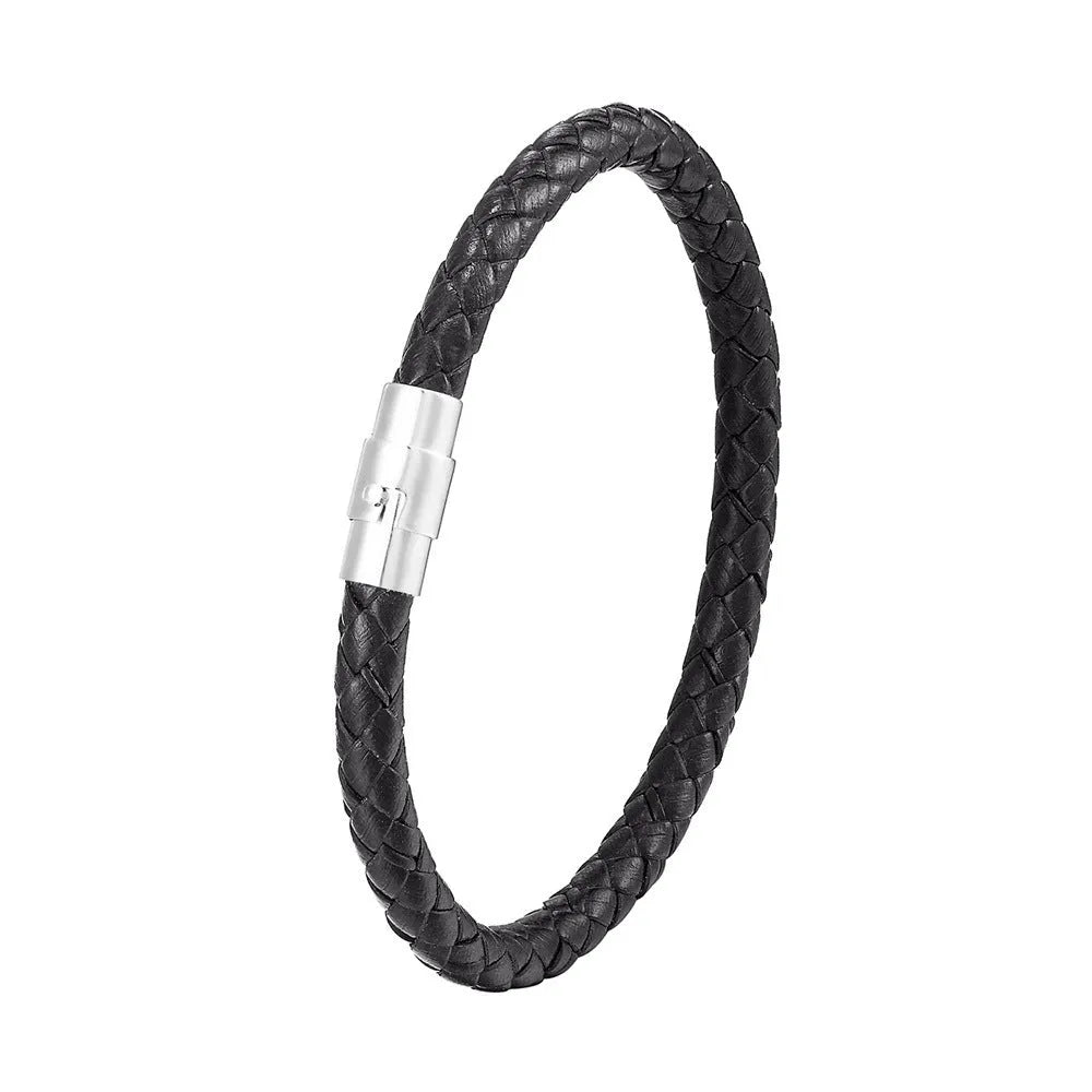 Geometric titanium steel wire bracelet with a magnetic clasp closure on a wrist.