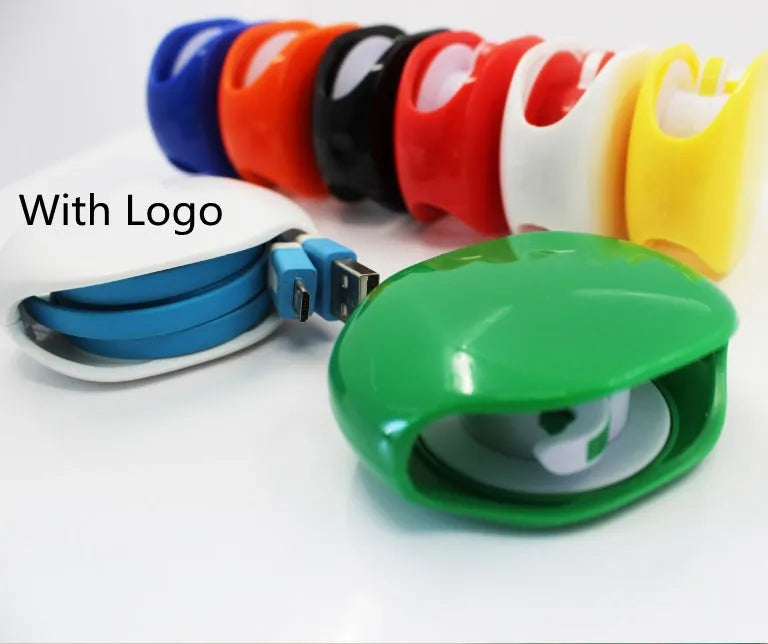 Automatic earphone cable winder retractor in blue, showing compact size next to a 3.5mm jack.