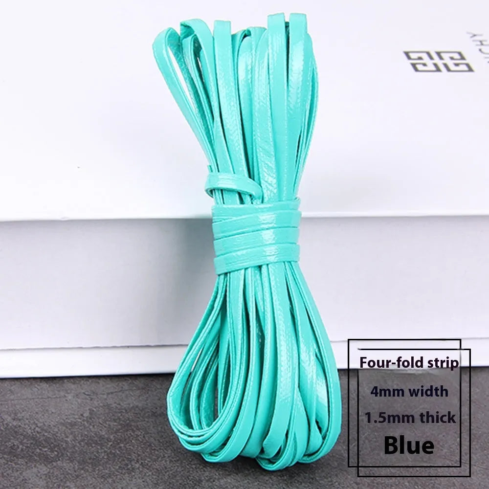 Coils of woven PU leather craft cord in various colours including black, brown, blue, red, and gold.