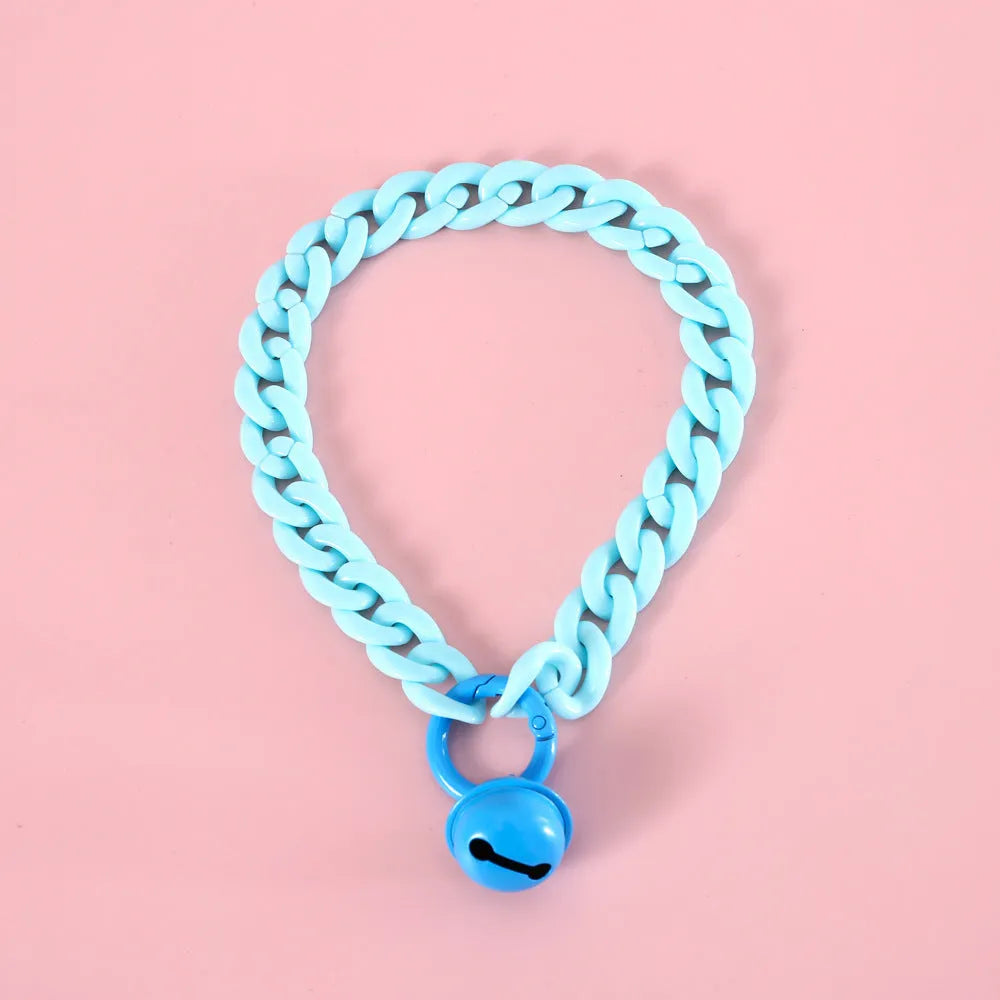 Adjustable plastic pet collar in candy chain blue colour on a white background, showing the monochrome pattern.