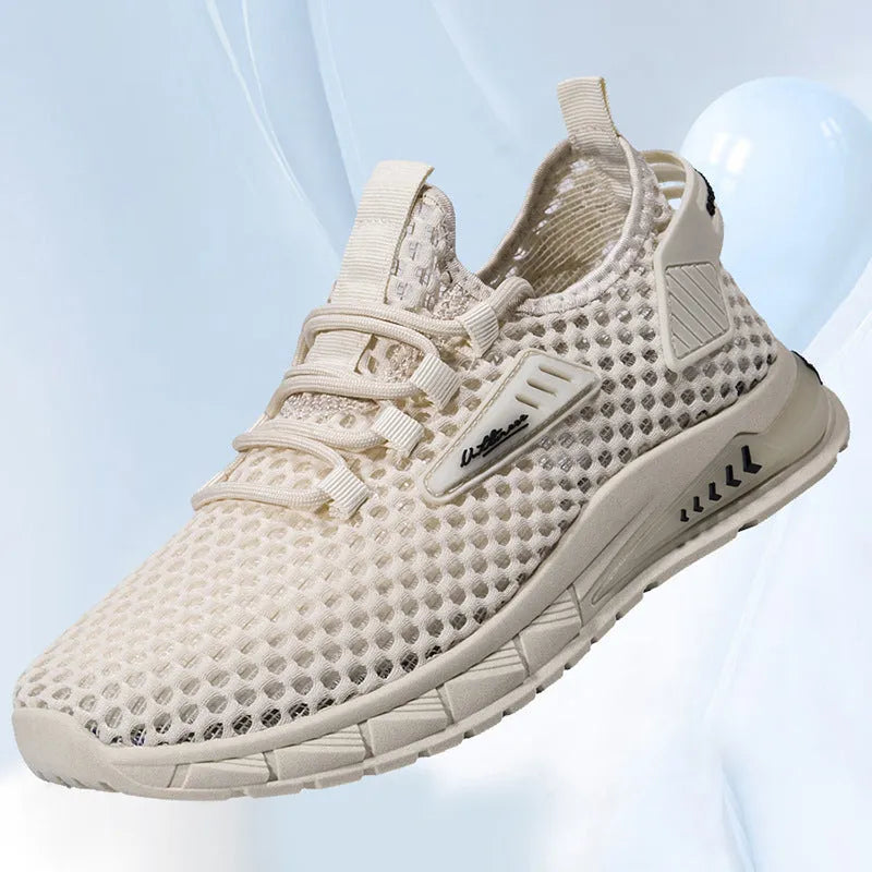 Men's beige casual sneakers with lace-up front, mesh panels, and a flat EVA sole.