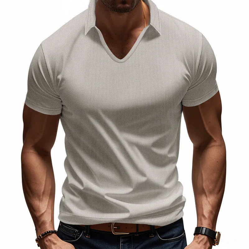 Men's loose fit light grey cotton blend V-neck short sleeve t-shirt laid flat.