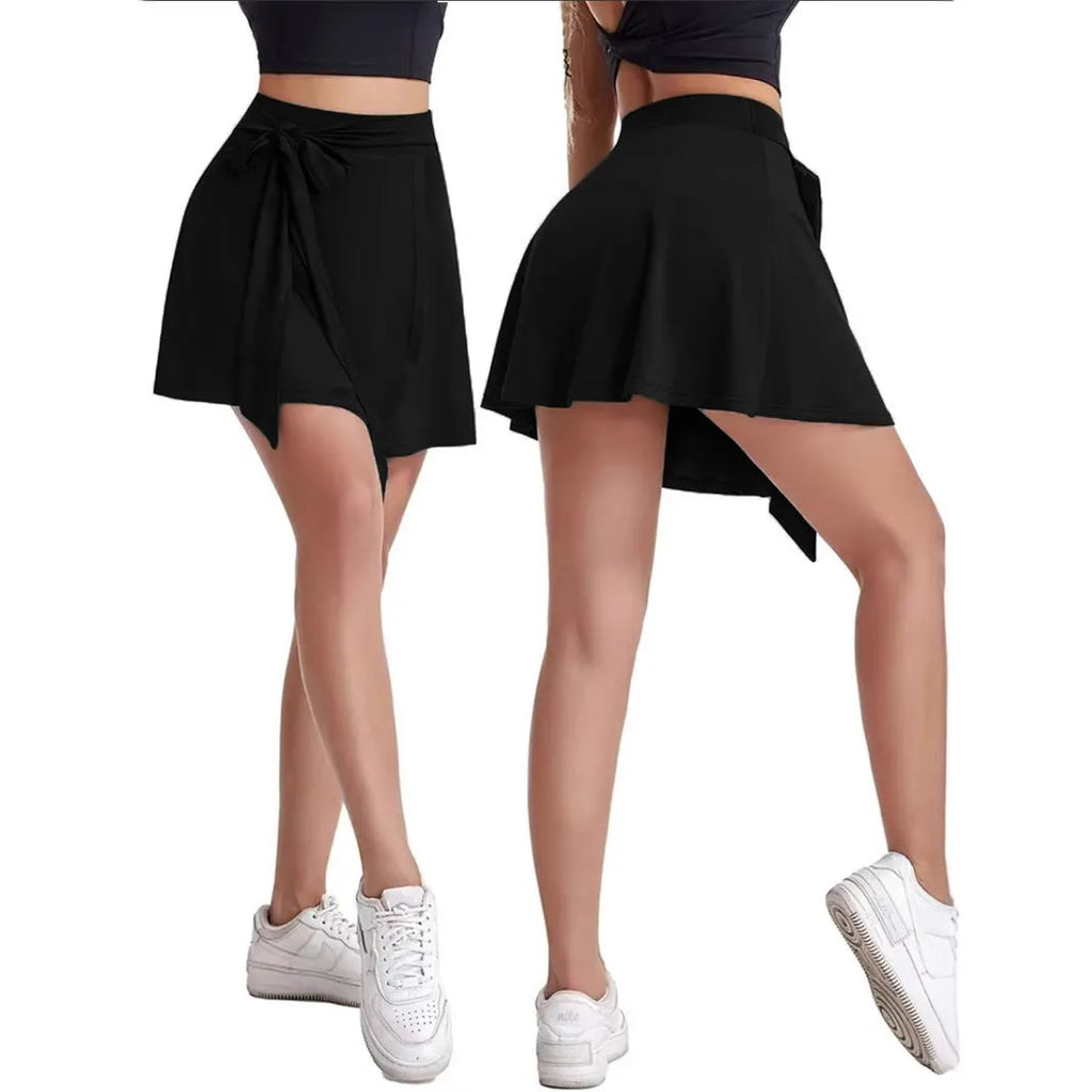 Black thigh-length sports skirt with built-in shorts, shown with high waist and casual Japanese Korean style details.