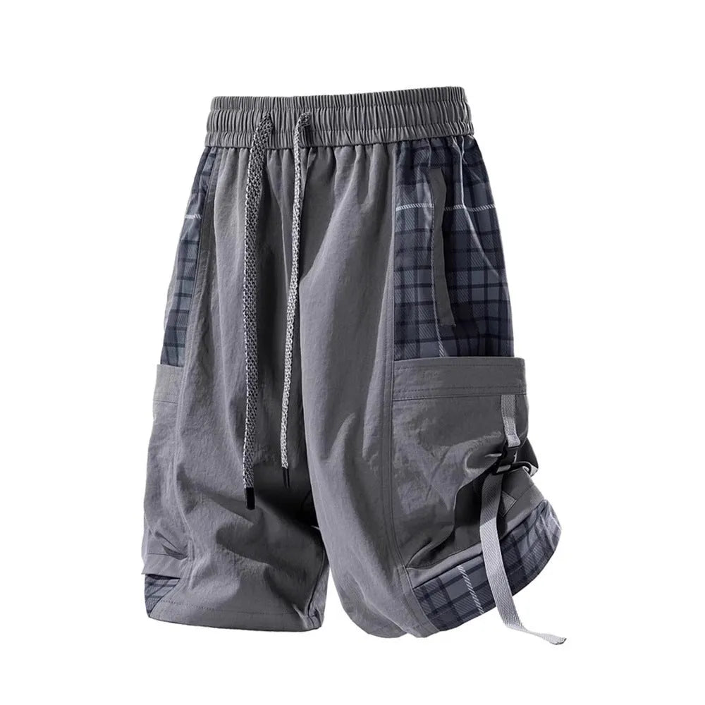 Men's loose-fit cargo shorts with plaid stitching detail in light grey.
