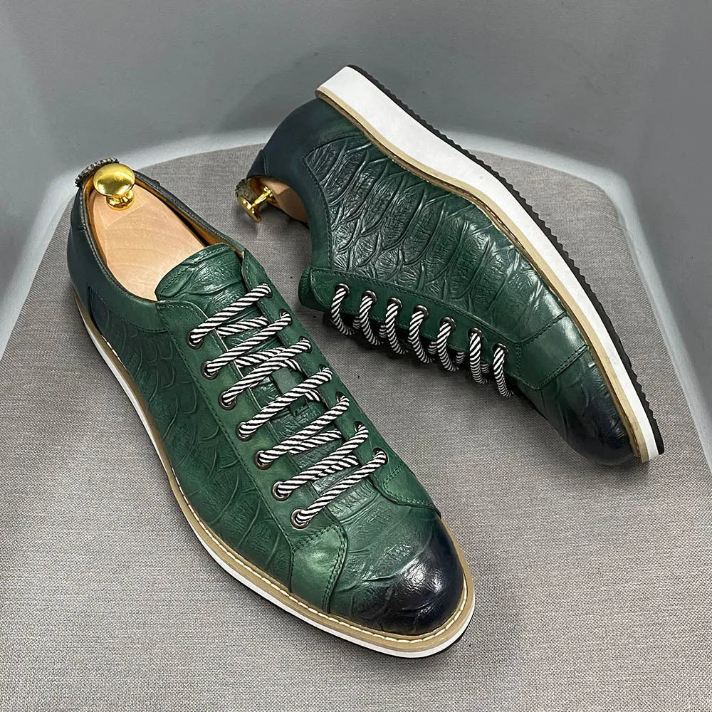 Men's low-top handmade shoes with embossed pattern on upper, shown in black with front tie laces.