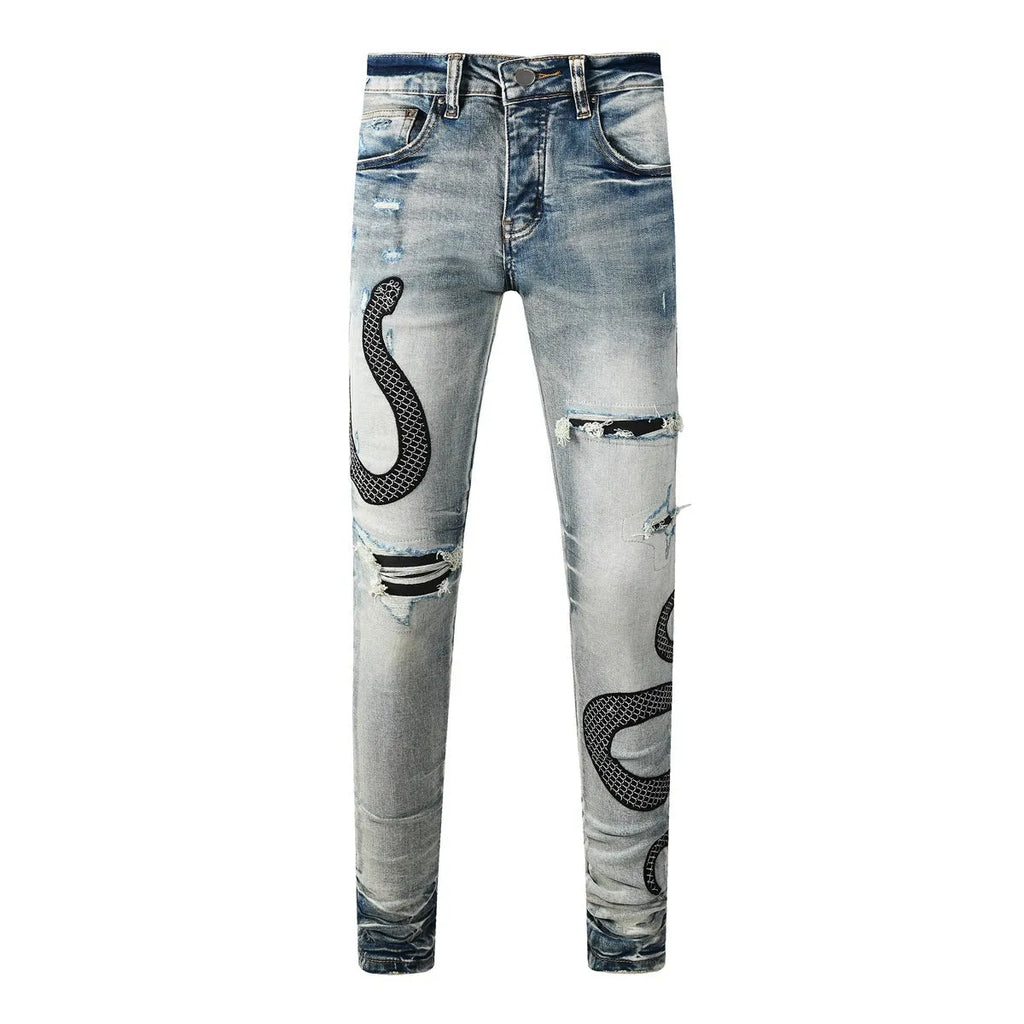 Man wearing 8934Blue distressed skinny jeans with a retro wash and skinny leg fit.