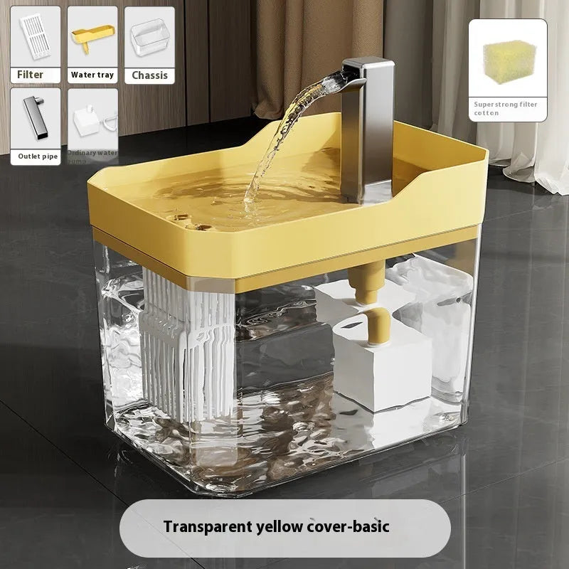 Automatic cat water fountain with filter in transparent plastic, showing water flow.