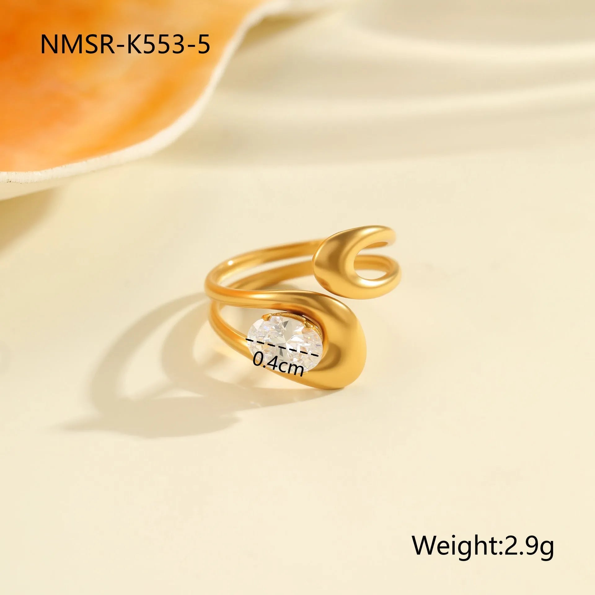 Geometric stainless steel ring with open mouth adjustable design and faceted zircon centrepiece