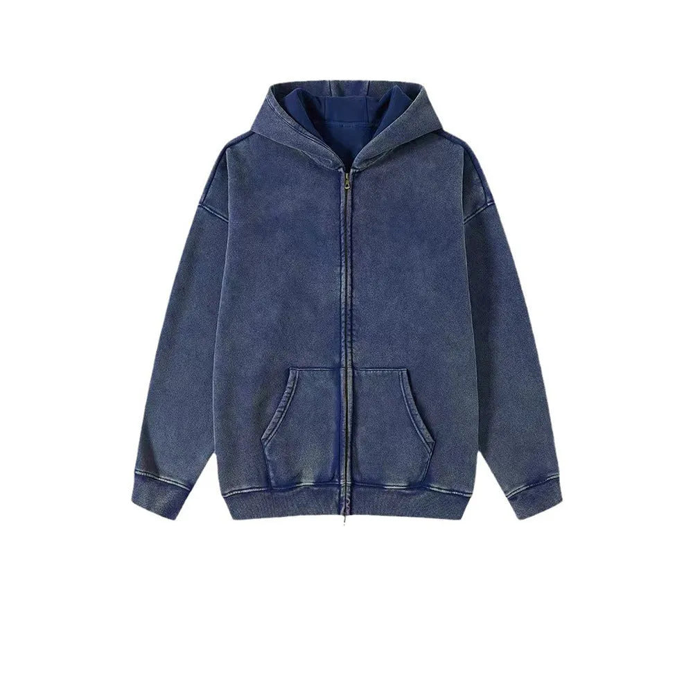 Man wearing a vintage washed cotton hooded cardigan with a fleece lining and double zipper.