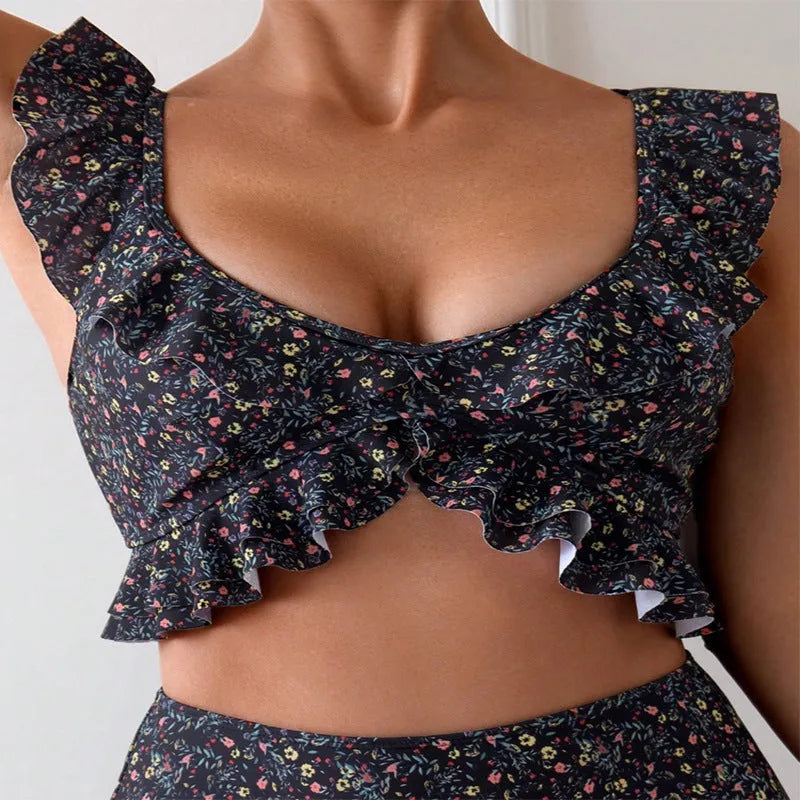 Women's floral flounce split swimsuit, backless two-piece in polyester, available in multiple colours.