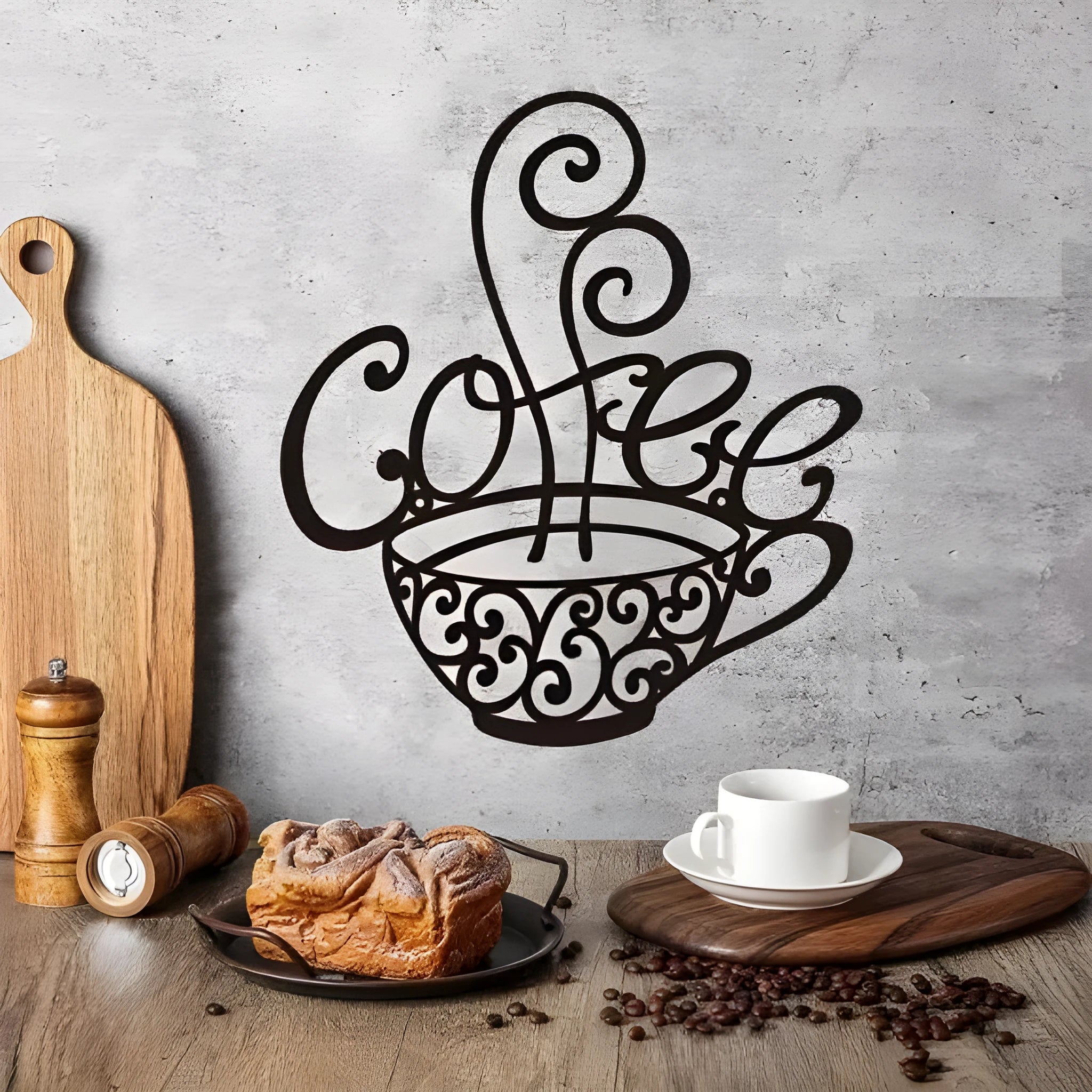 Black wrought iron English letters silhouette wall decoration measuring 26 by 28 centimetres