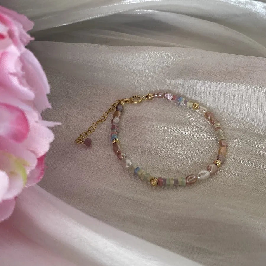 Natural pearl bracelet and necklace set with small irregular pearls and 14K gilded purple silver finish.