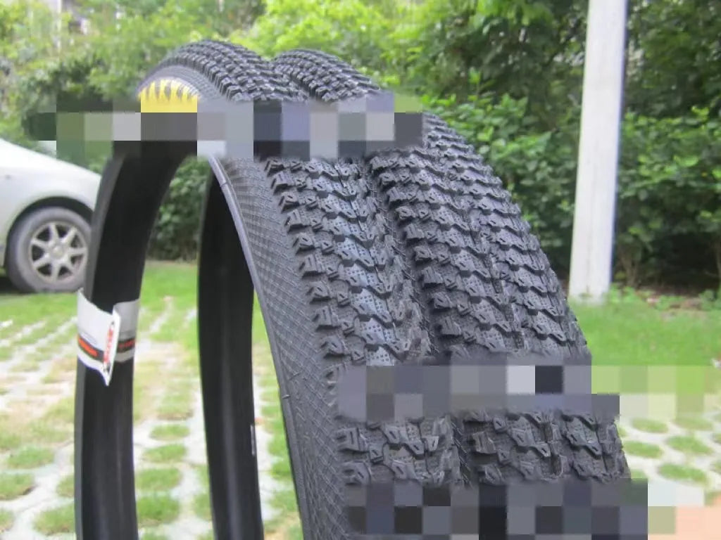 Mountain bike ultralight puncture-proof tyre in multiple size options for 26, 27.5 and 29-inch wheels.
