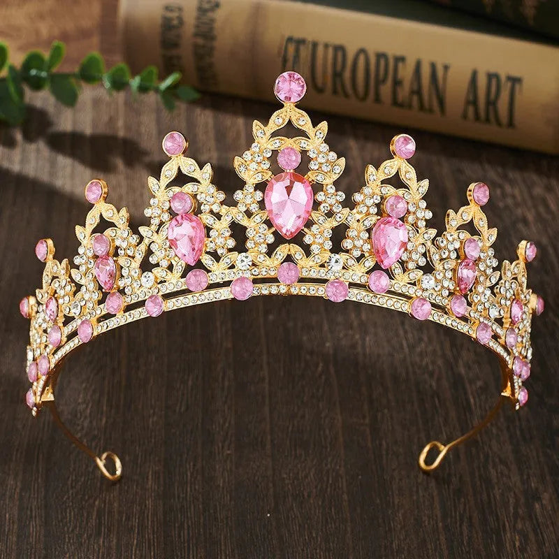 Gold alloy crown-shaped wedding hair headdress with electroplated finish on neutral background