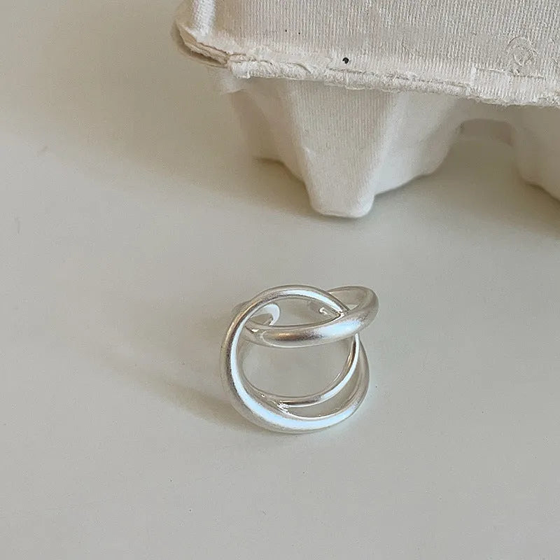 Three-dimensional interlaced geometric open ring in matte gold or silver electroplated finish