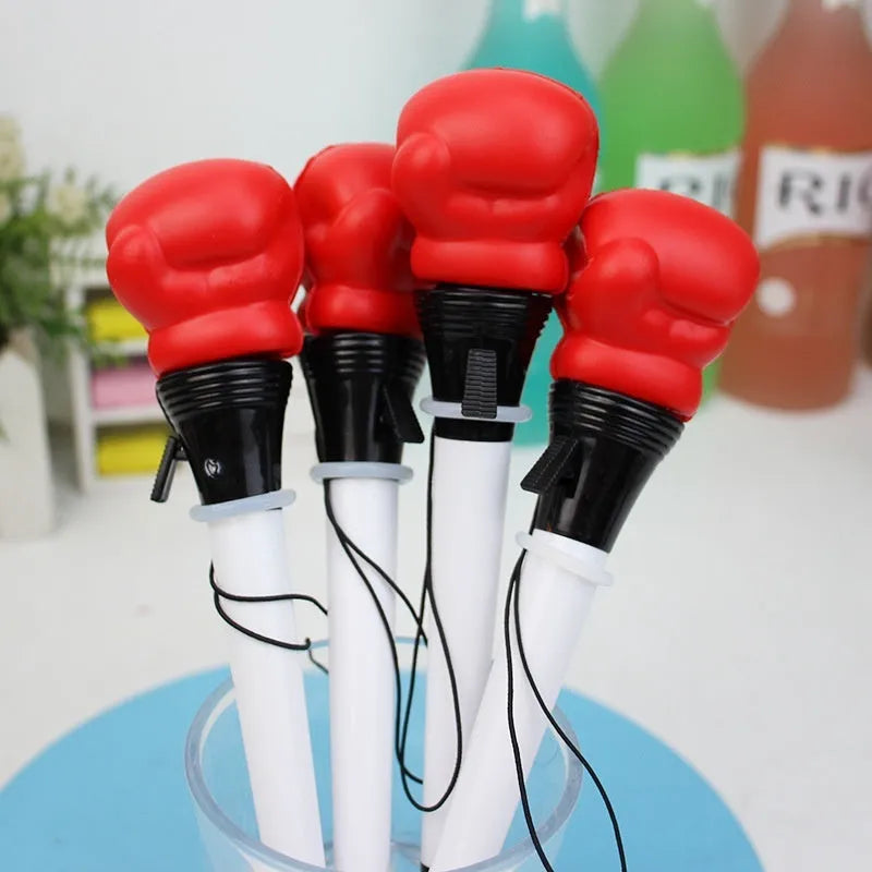 Four boxing press ejection pens with black ink and 0.7mm bullet tips