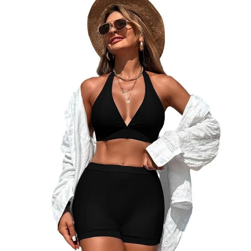 Women's black split bikini swimsuit for swimming and hot spring bathing.