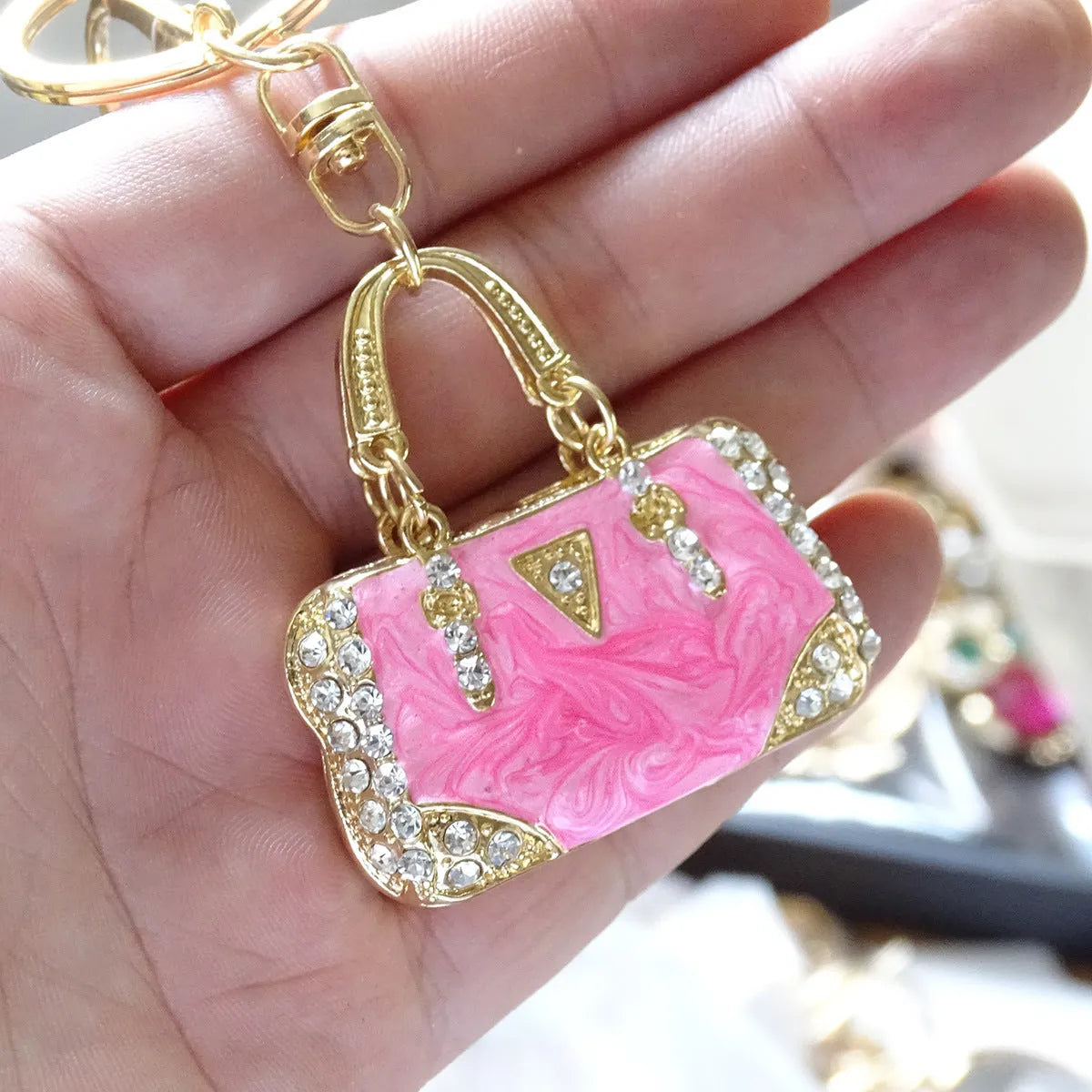 Alloy pendant keychain with enamel diamond cloud pattern in gold colour on keyring