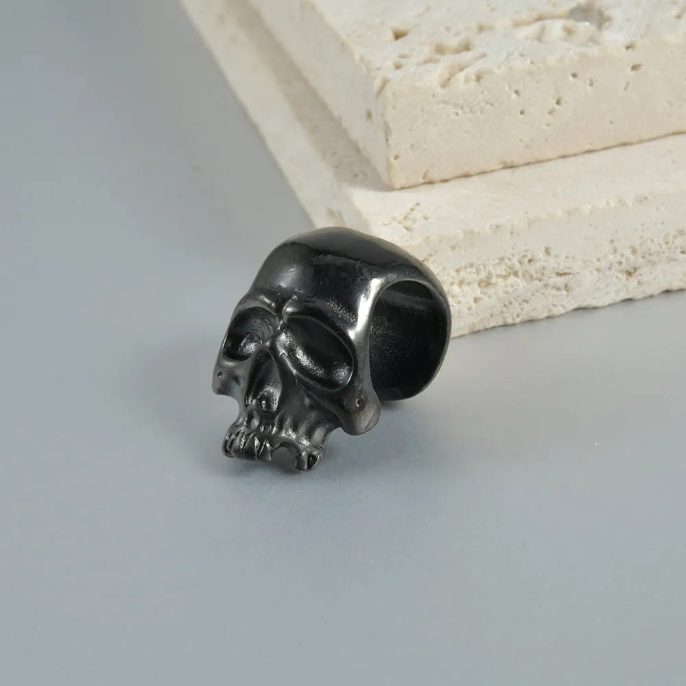 Stainless steel hollow geometric skull and Buddha head earrings with electroplated finish
