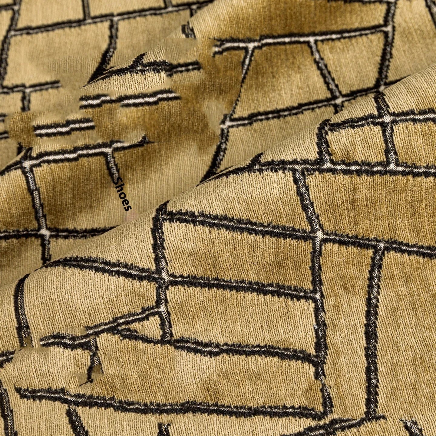Tuhao gold geometric abstract pattern on square and lumbar cushion covers.