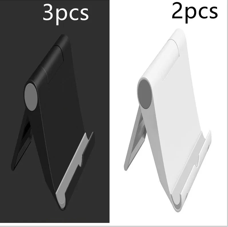 Black PE folding phone and tablet stand with soft rubber backing, shown at an adjustable angle.