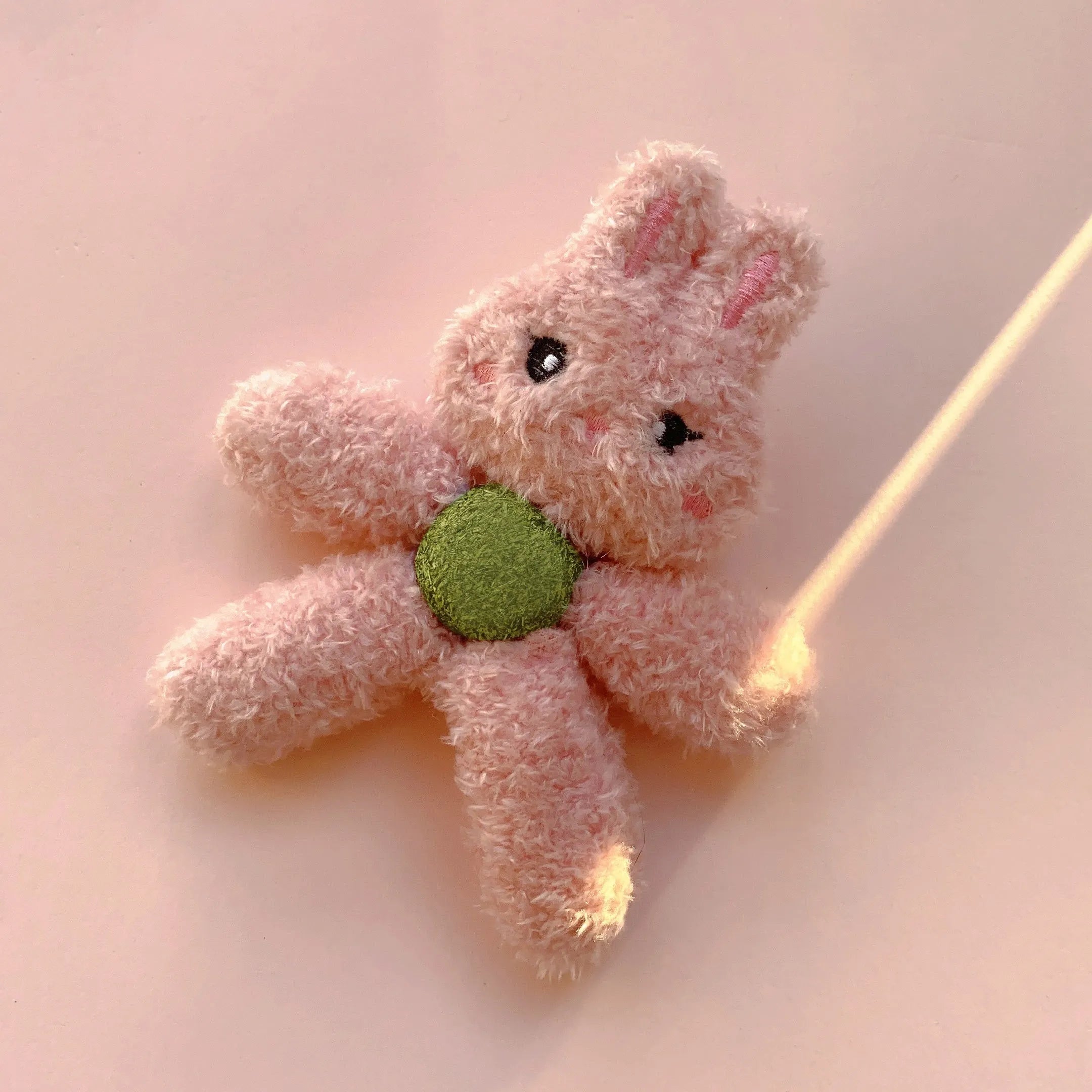 Catnip chewing ball toy in animal designs for dental cleaning and interactive play