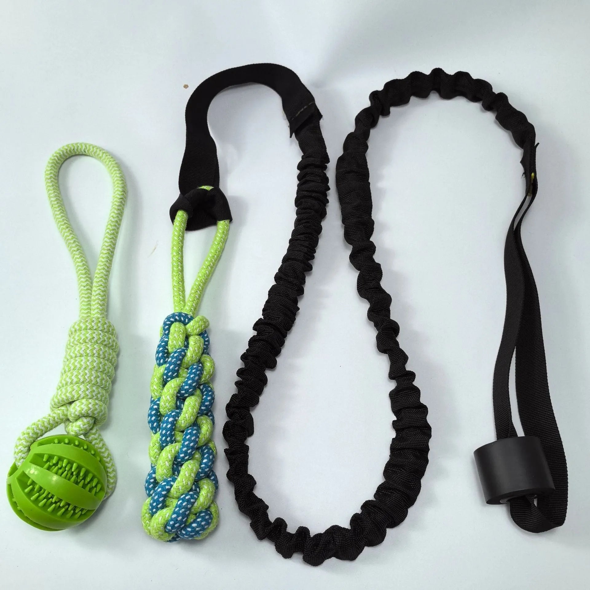 Green cotton rope dog toy with corncob design for tug of war and biting.