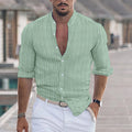 Men's striped cardigan shirt in loose fit with long sleeves, white stripe pattern on brown background