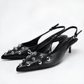 Women's black low-cut pointed-toe wedge stiletto heels with rivet decoration and slip-on design