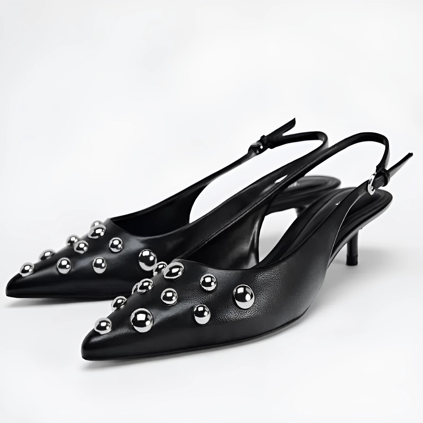 Women's black low-cut pointed-toe wedge stiletto heels with rivet decoration and slip-on design