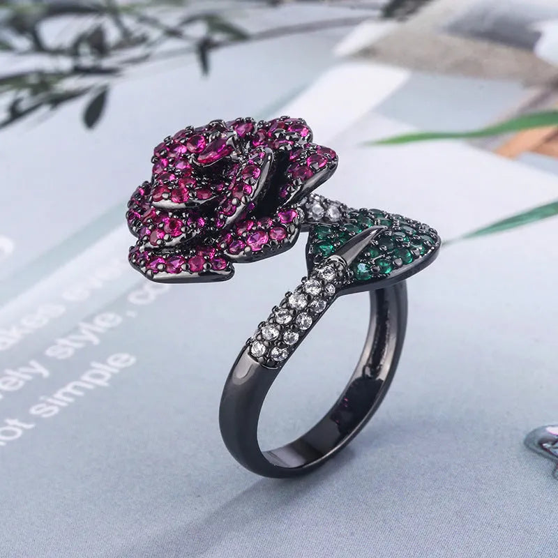 Geometric black gold ring with simulated red corundum stones on gold-plated copper band