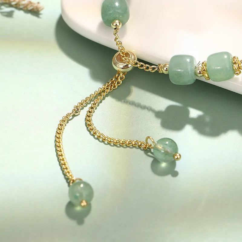 Rabbit bracelet with green aventurine and strawberry quartz beads, copper and gold-plated details