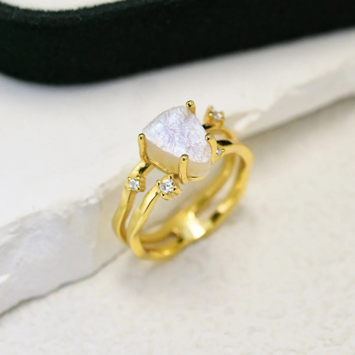 S925 sterling silver ring with an irregular triangle moonstone in a choice of gold-tone plating.