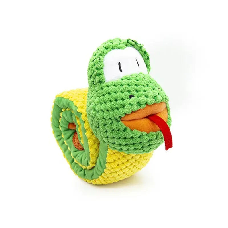 Green transformable plush dog toy shown in snail and stick shapes with squeakers and food holes.