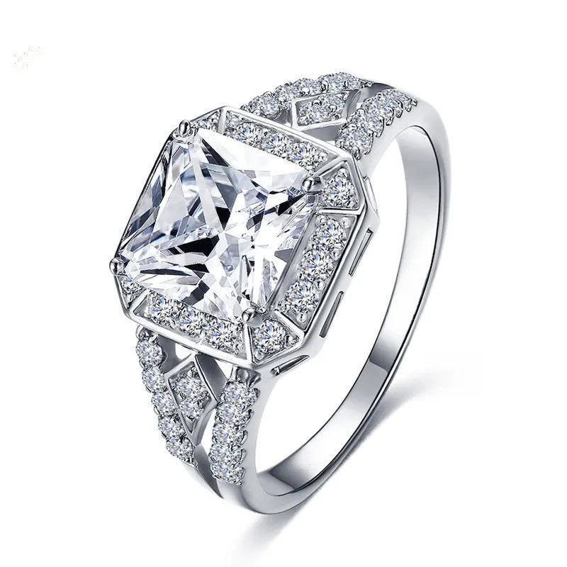 Geometric women's zircon ring with hollow design and platinum-colour finish shown from multiple angles