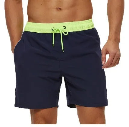 Men's blue fitness shorts with a stitching waistband, drawstring, and a side headband pocket.