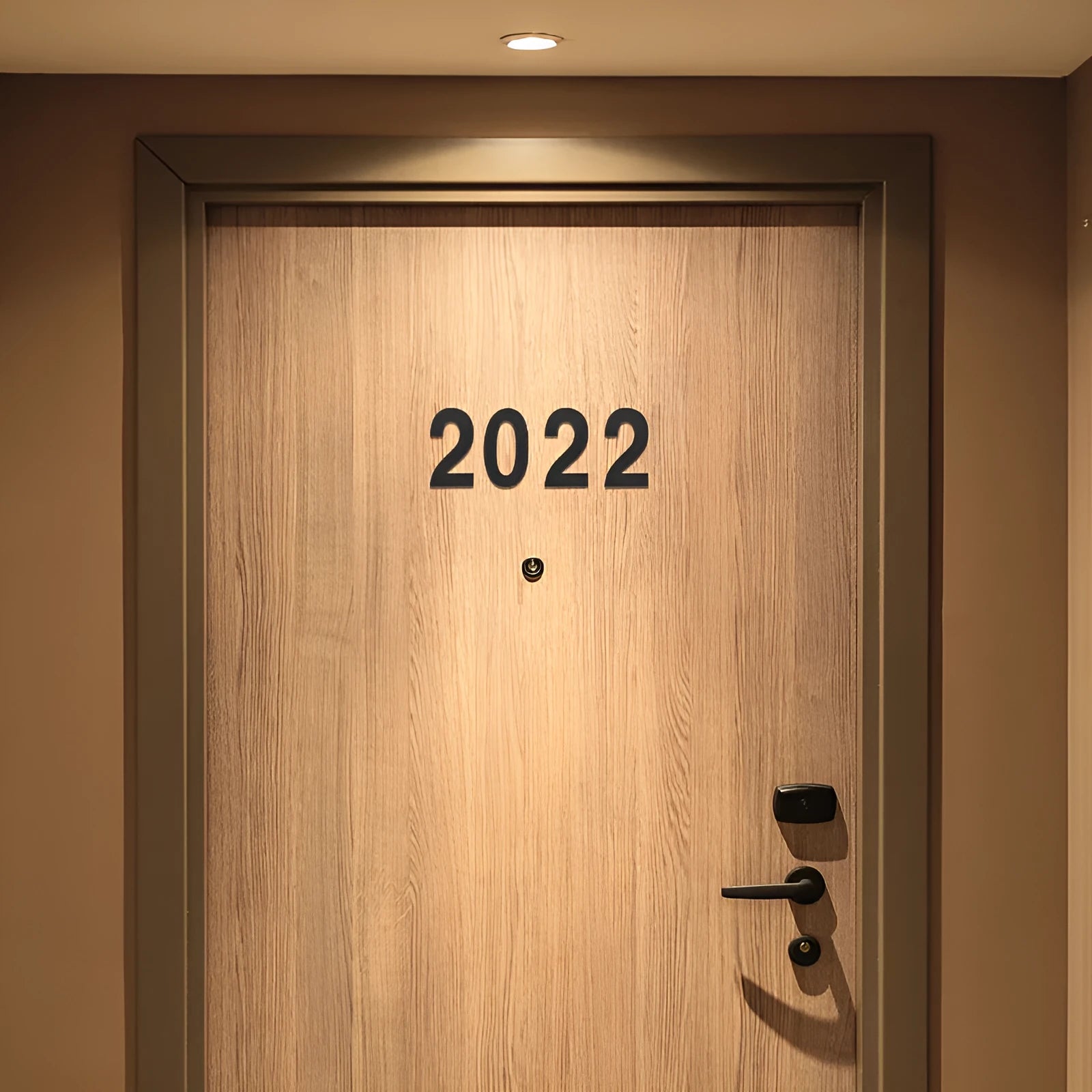 Black stainless steel sticky house number sign showing digits 7.5 cm tall