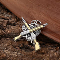 925 sterling silver pendant with dual gun heart-shaped design, 34 by 31 millimetres, silver colour