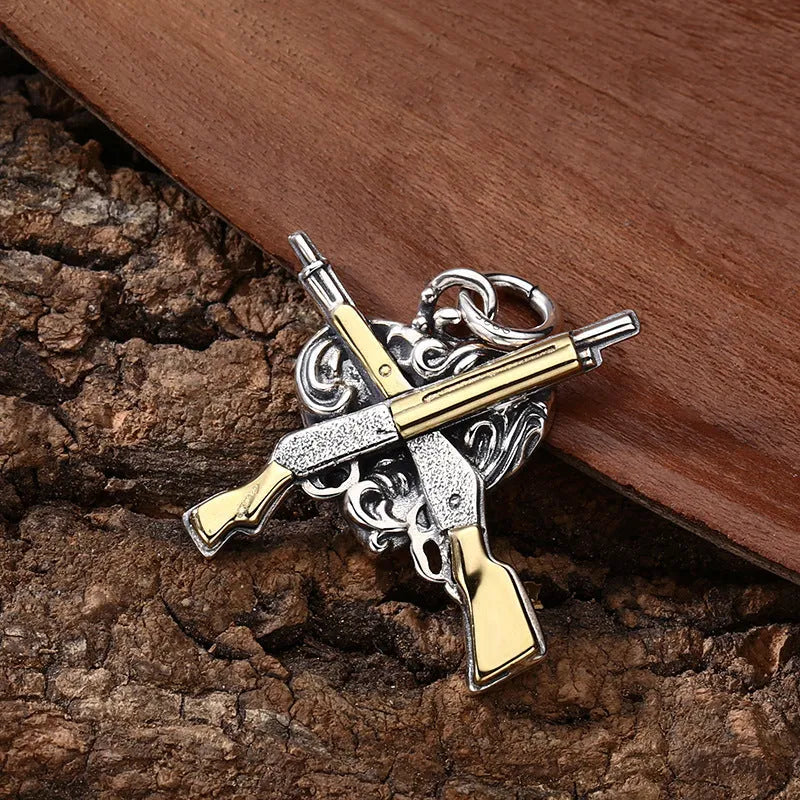 925 sterling silver pendant with dual gun heart-shaped design, 34 by 31 millimetres, silver colour
