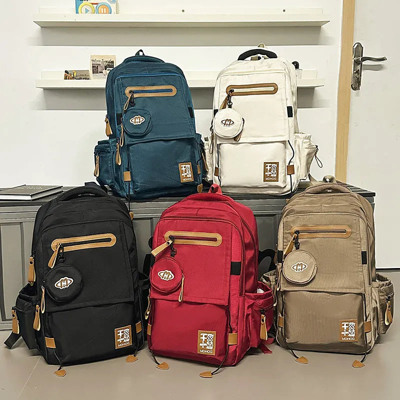 Large waterproof nylon leisure travel backpack in multiple colours with contrast stitching details