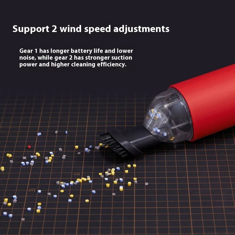 Portable desktop vacuum cleaner with metal and plastic body for dust and debris in cars and keyboards