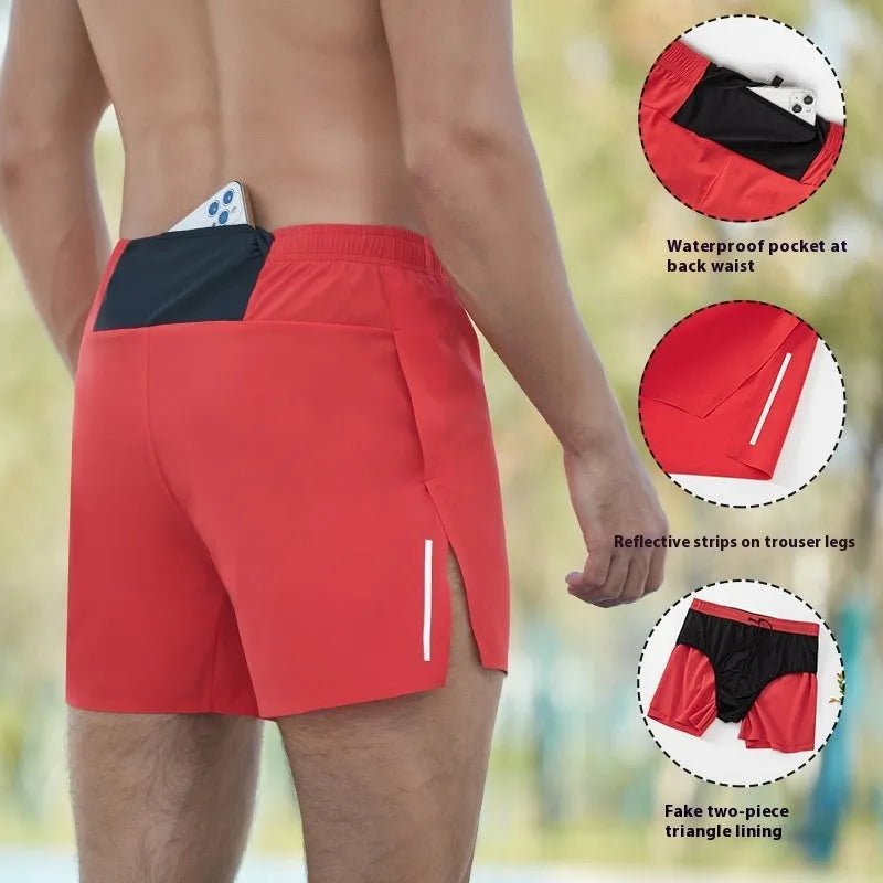 Man's high-waist loose fit off-road running shorts in black, showing quick-dry fabric and inner lining detail.