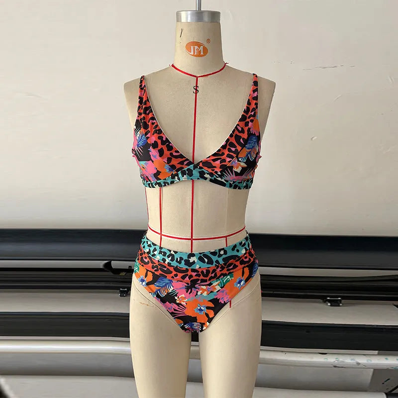 Women's high-waisted floral print bikini set on a mannequin.