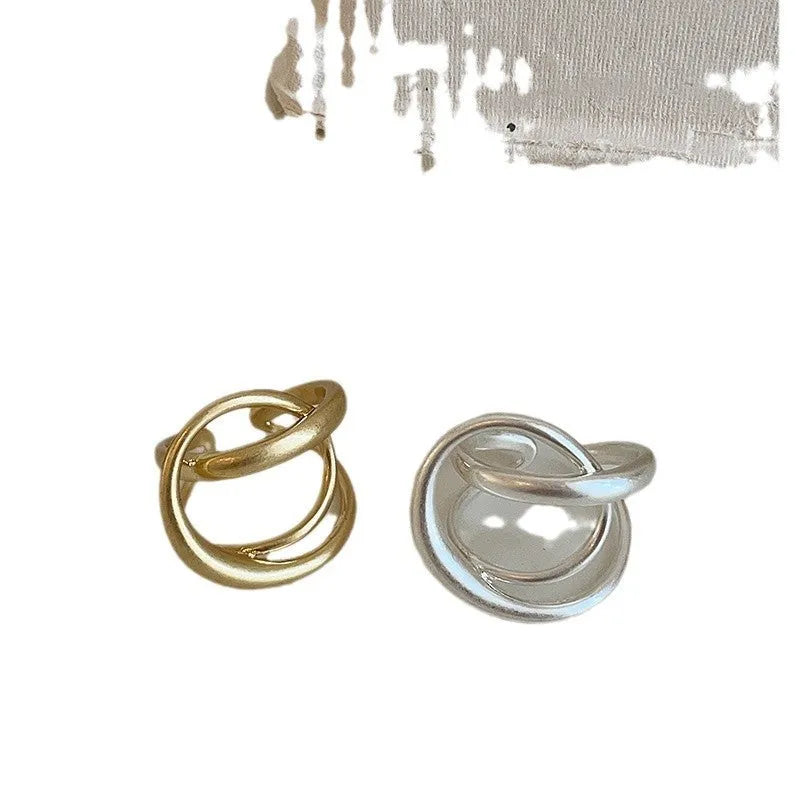 Three-dimensional interlaced geometric open ring in matte gold or silver electroplated finish