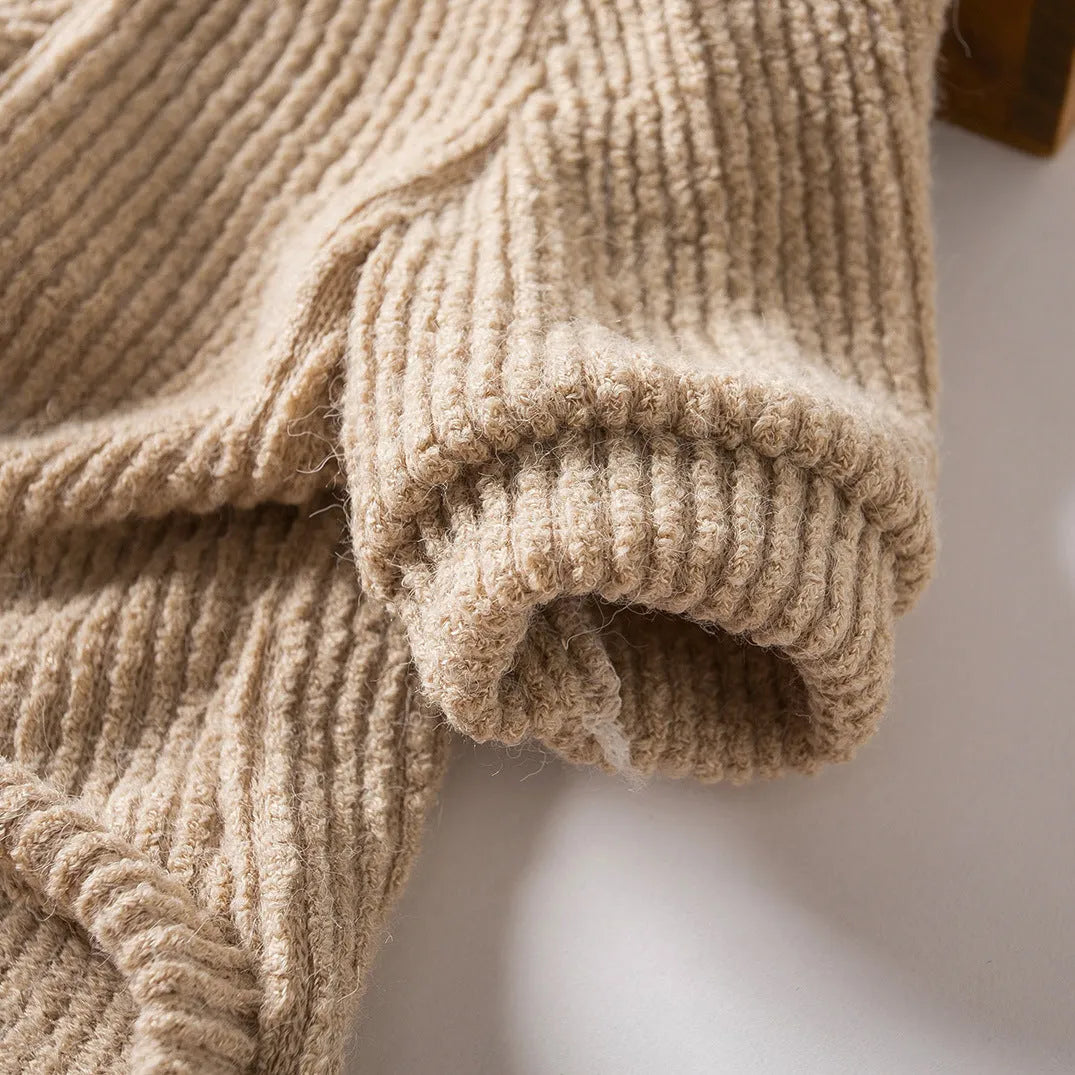 Brown cloth pullover sweater on a small dog, showing casual style and fit.