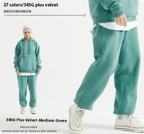 Men's solid colour cotton velvet sweatpants with ankle banding in a mid waist design