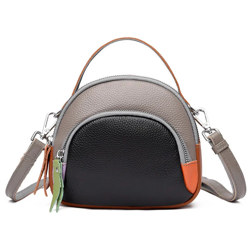 Hand-held crossbody first layer cowhide leather single-shoulder bag in soft round shape with sewing line detail